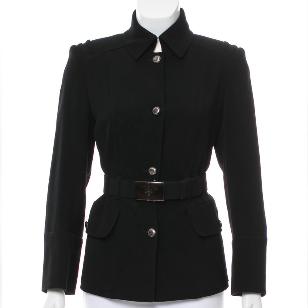 Black Prada wool blazer with notched lapels, long sleeves and belt at waist.